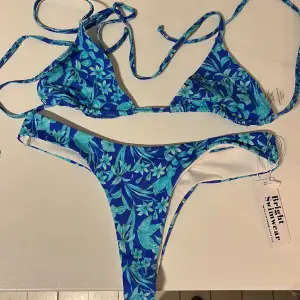 Triangle bikini top and thong bikini bottom Never used  Super comfortable I have one in another color