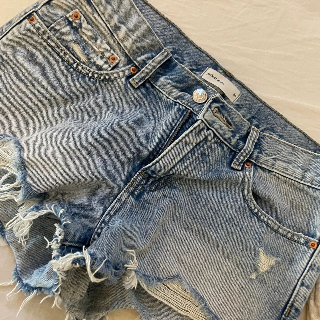 Lågmidjade jeansshorts  - 91