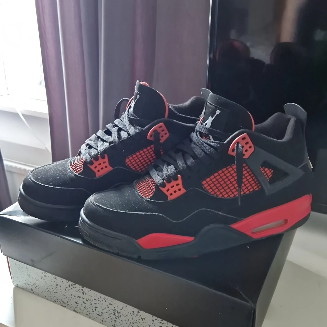 Jordan 4 red thunder