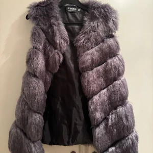 Päls jacka  - Fick denna för Många år sen.  