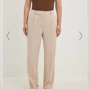 Kostymbyxor  - Oanvända kostymbyxor Endast testade