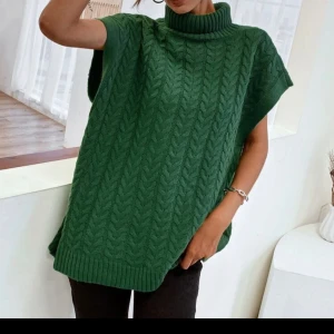 Stickad väst  - Använd 1 gång. 