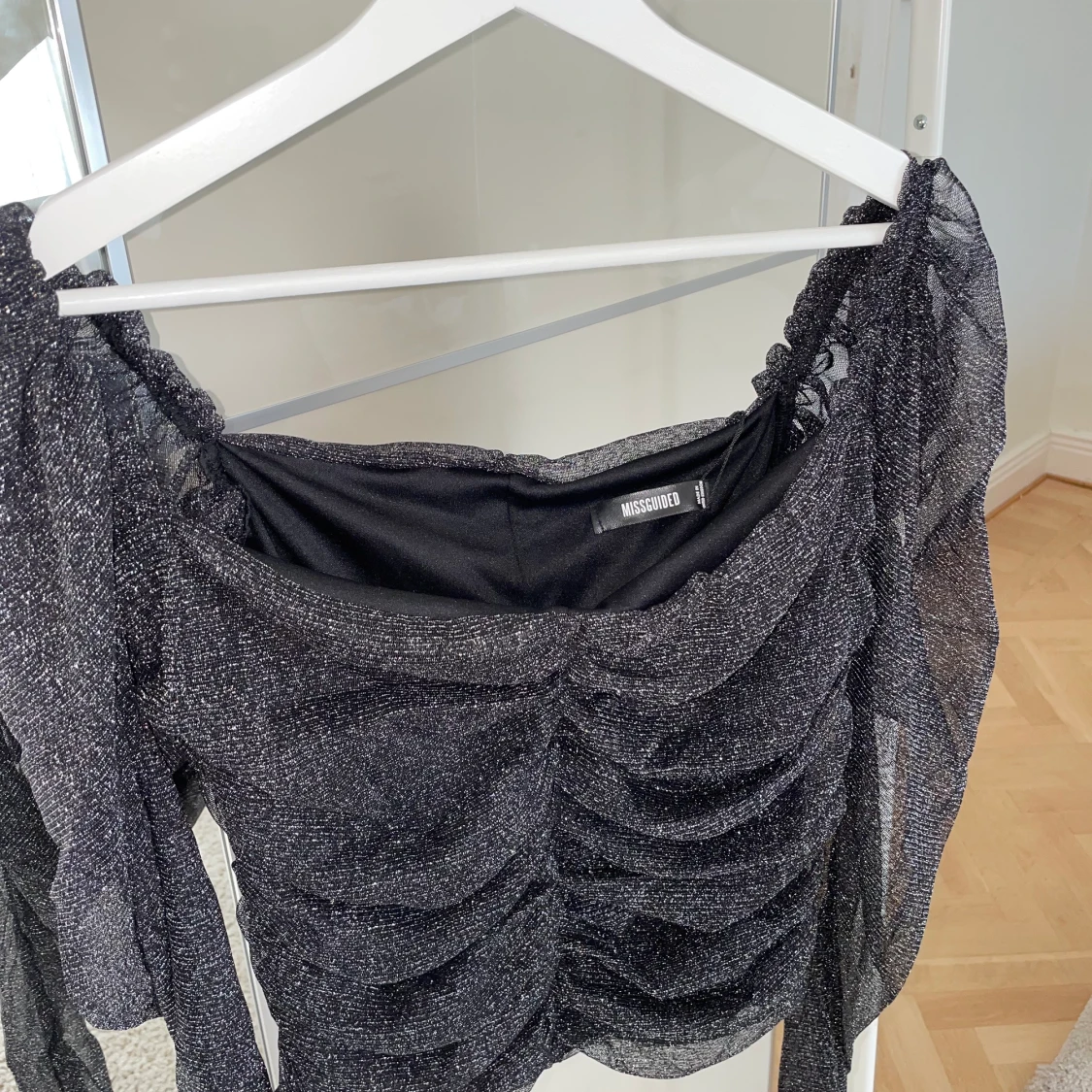 Glittrig långärmad topp - 90