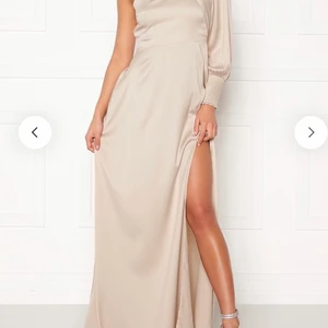 Siden klänning storlek 34 - Använd endast en gång 