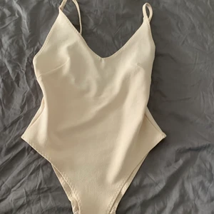 Body hm  - Body från hm. Oanvänd. Storlek m 