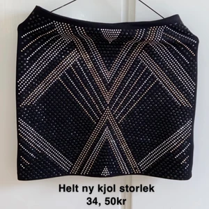 Kjol med strass - Helt ny kjol med strass i storlek 34