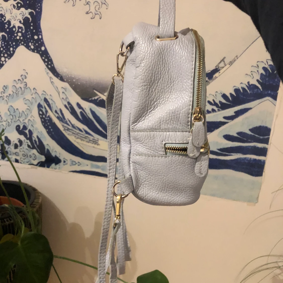 Skinnväska som är ljusblå  - 90