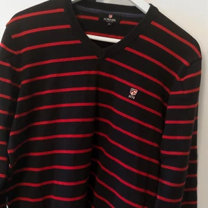 Mörkblå US POLO ASSN. tröja - Cond 10/10.