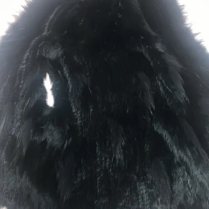 Snygg päls väst med luva - Svart pälsväst med luva sitter super snyggt på och skönt. I kaninpäls.