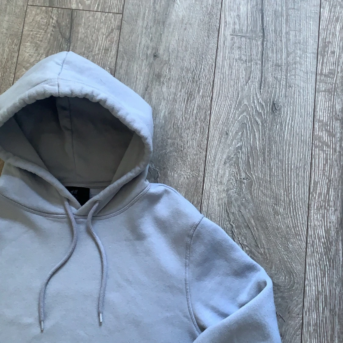 Ljusblå hoodie strl M - 90