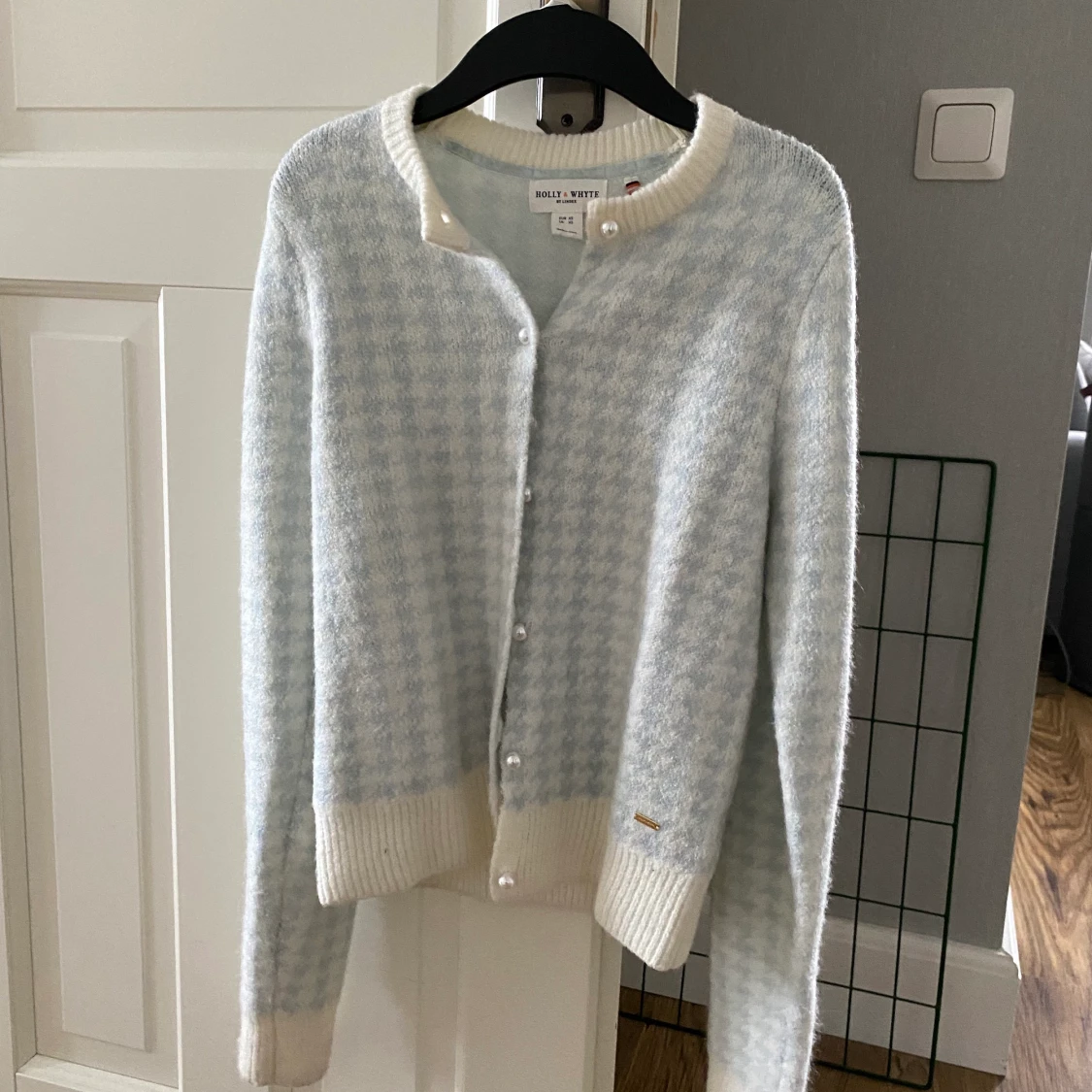 Stickad tröja i storlek XS