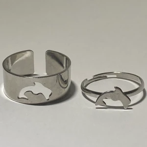 Ring - Silverring set i form av delfiner för honom och henne.