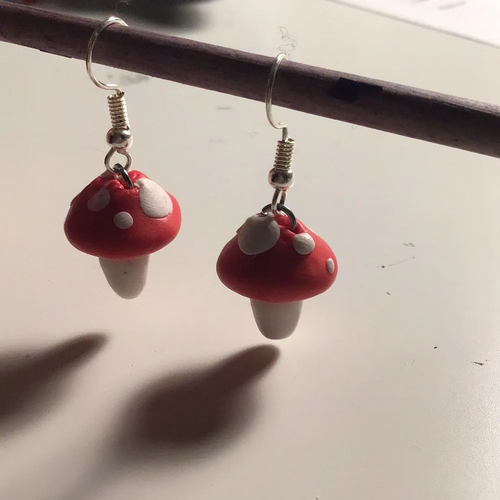 Red mushroom earrings made from clay. ❤️🤍. Accessoarer.