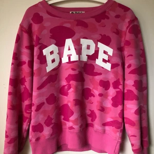 Women’s Bape Camo Sweatshirt  - Women’s Bape Camo Sweatshirt  Size small Great condition, no flaws or damage.  Fits like a regular small women’s sweatshirt. DM if you need exact size measurements.   Buyer pays for all shipping costs. All items sent with tracking number.   No swaps, no trades, no offers. 