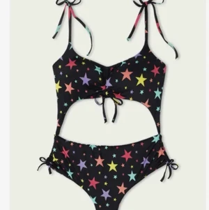 Baddräkt  - Med stjärnor (öppen, ser ut som en bikini bakifrån)