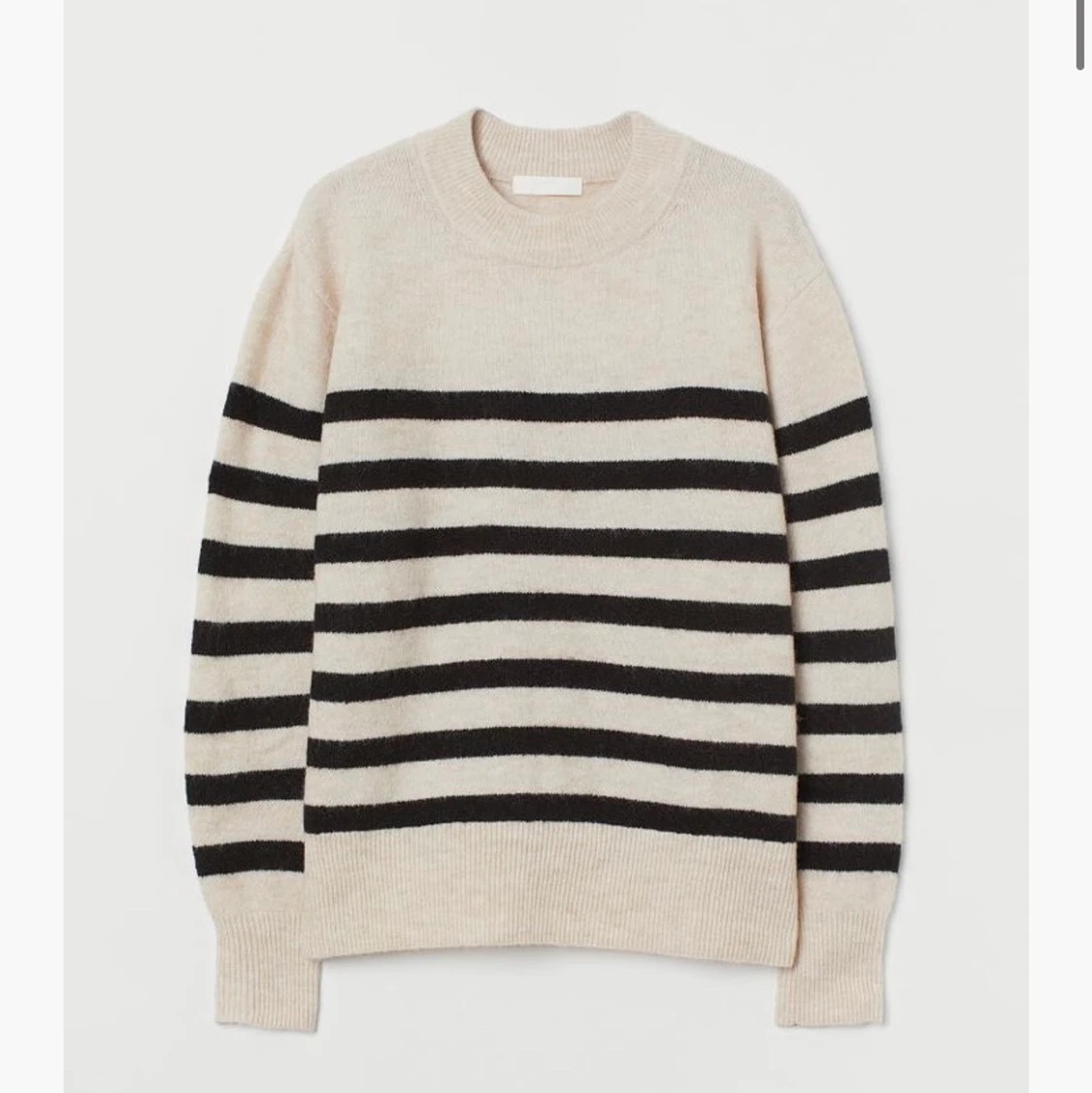 Randig stickad tröja