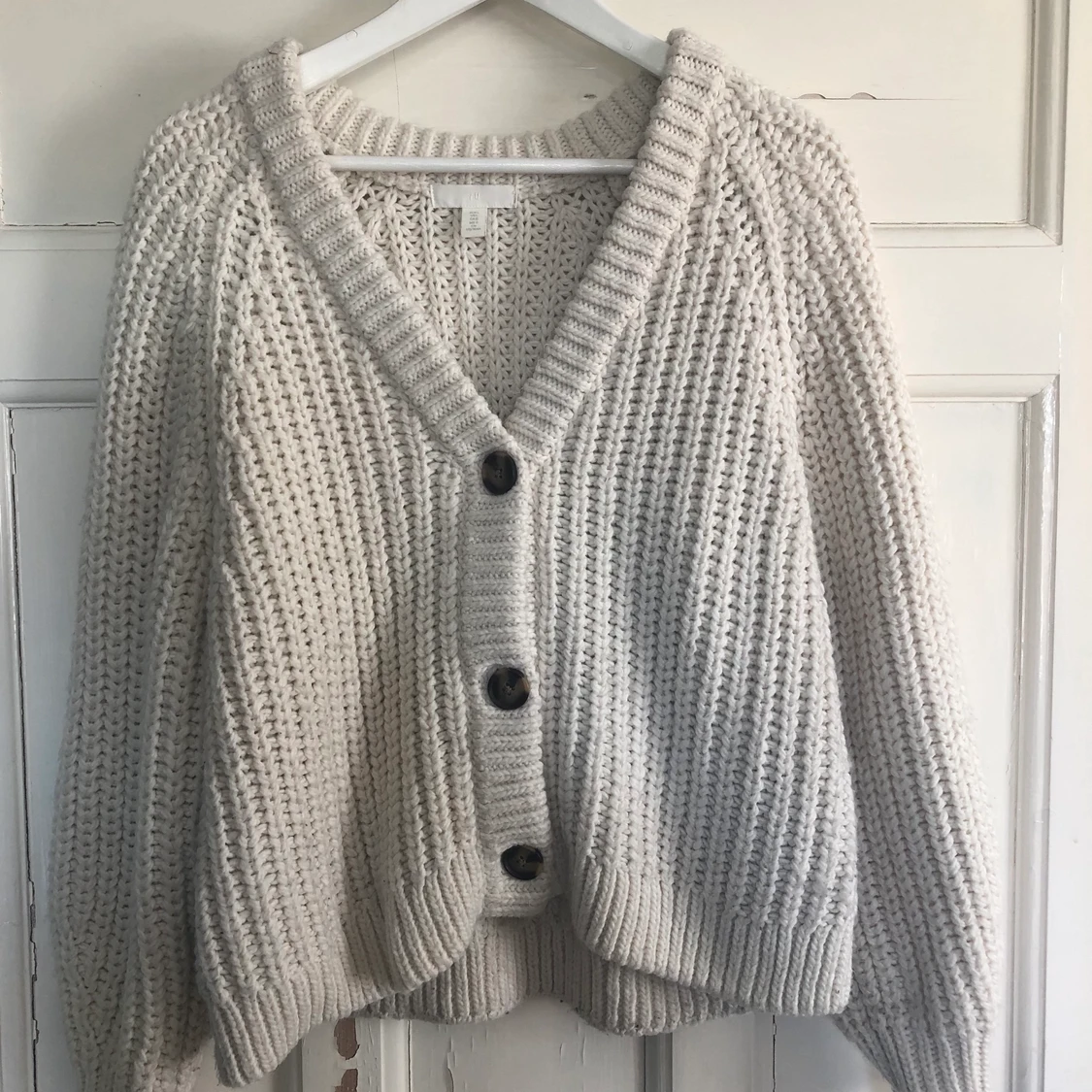 Ribbstickad kofta storlek L 