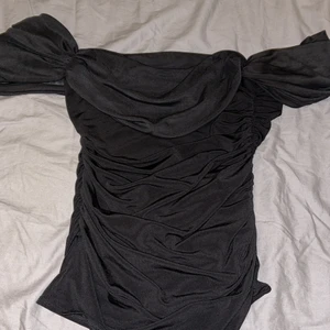 Svart body - En fin svart body i väldigt bra skick!