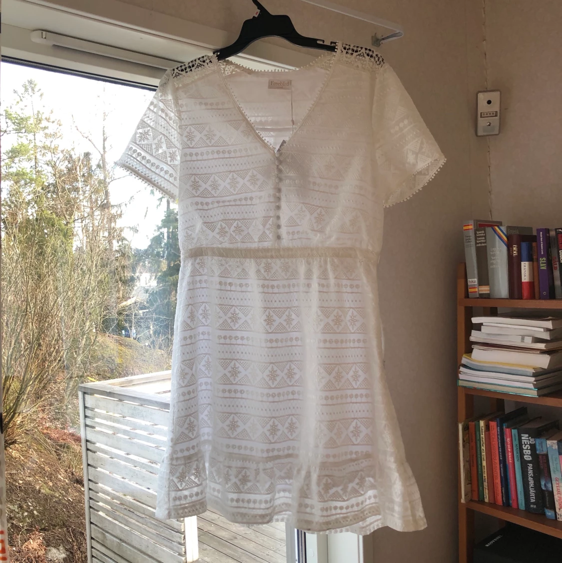 Oanvänd klänning från freebird