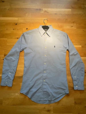 Ljusblå skjorta från Ralph Lauren - Helt ny ljusblå skjorta från Ralph Lauren.