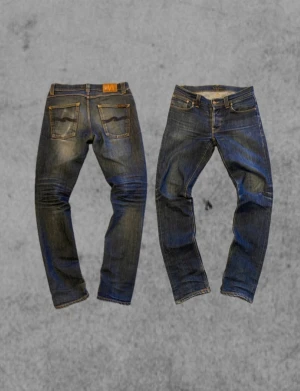 Nudie jeans grim Tim  - Säljer ett par Nudie jeans i modellen grim Tim. Storlek 32/34 men sitter mer som 31/32 typ. Mycket bra skick.