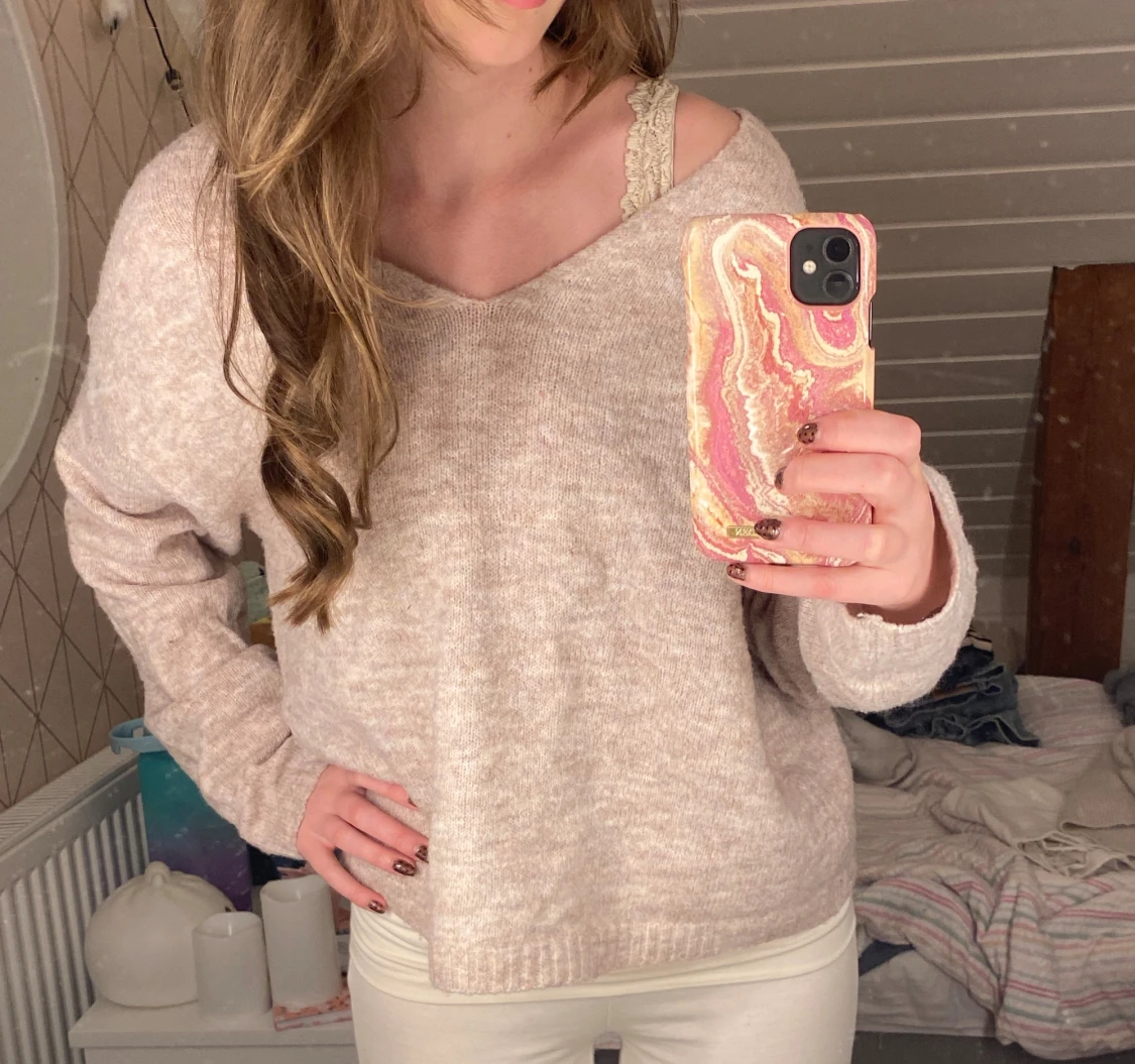 Beige stickad oversized tröja