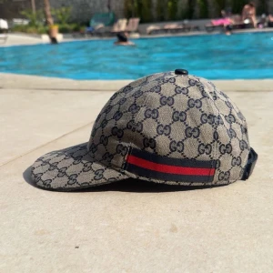 Guccii keps  - Använd,går lätt ner i pris och tags medföljer!