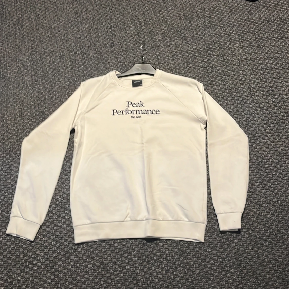 Vit sweatshirt från Peak Performance