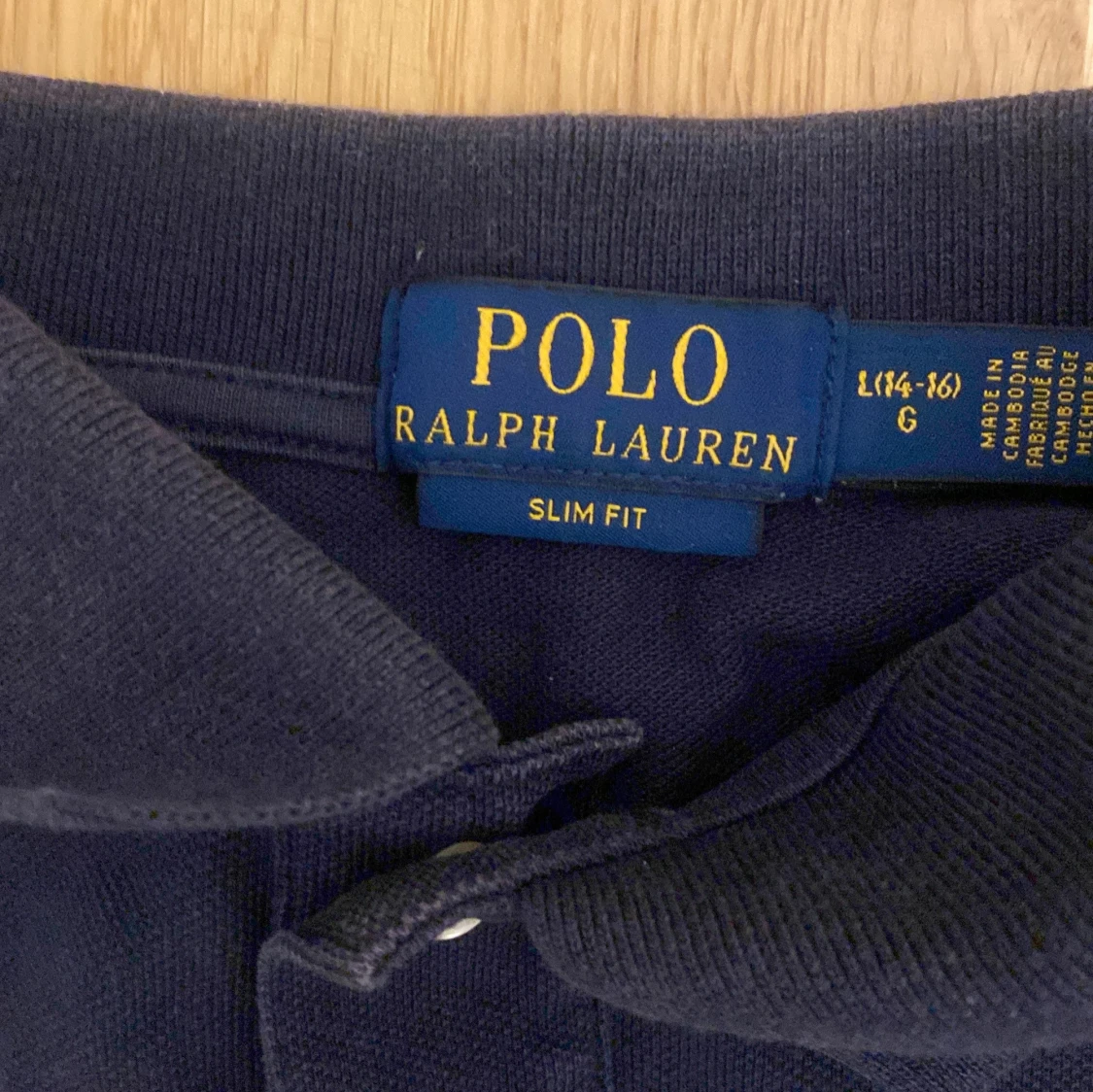 Mörkblå pikétröja från Ralph Lauren - 1