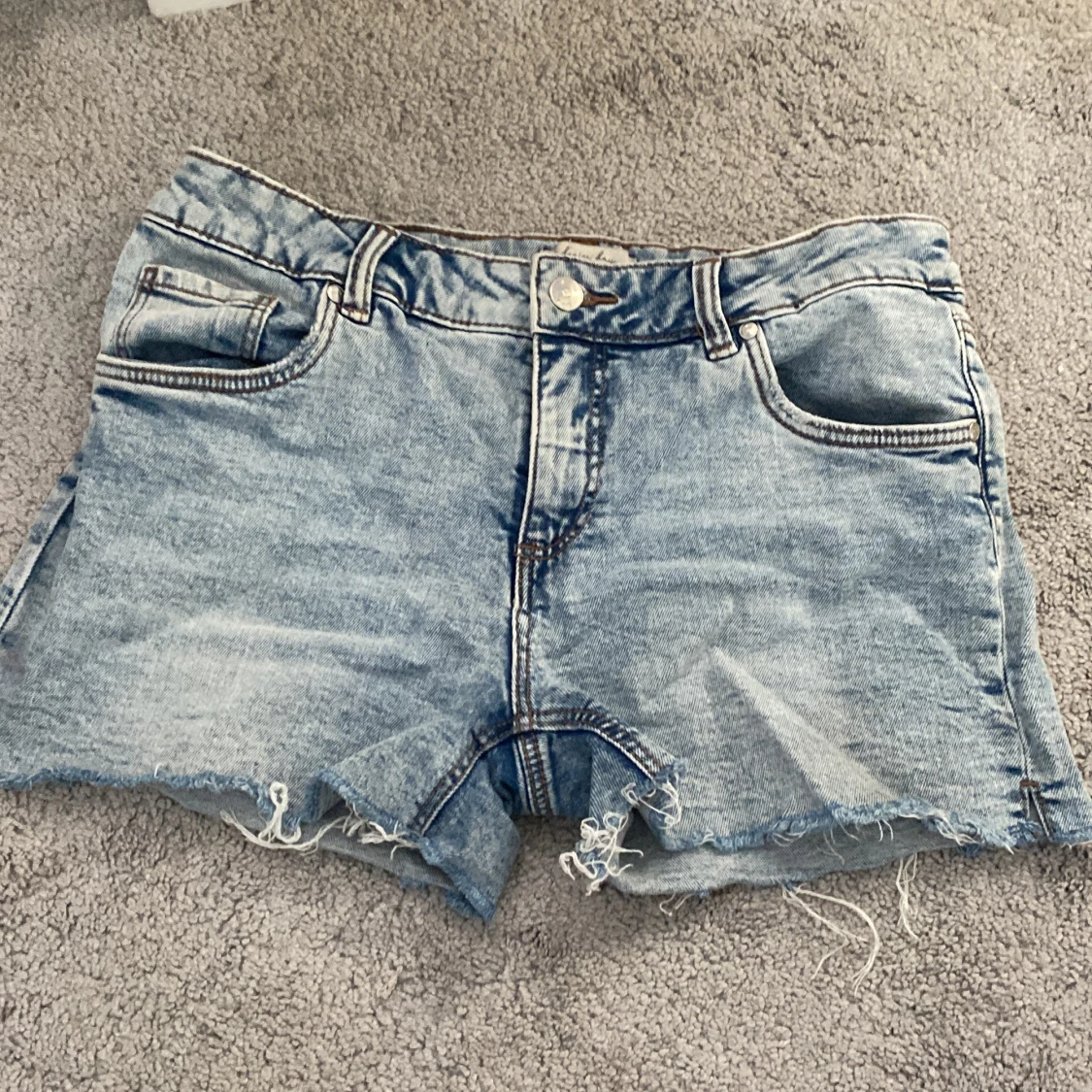 Ljusblå jeansshorts från Denim Day