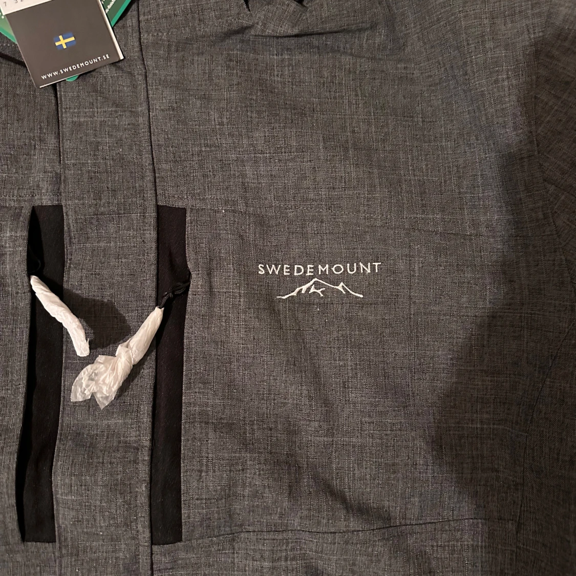 Grå vindjacka med huva från Swedemount - 2