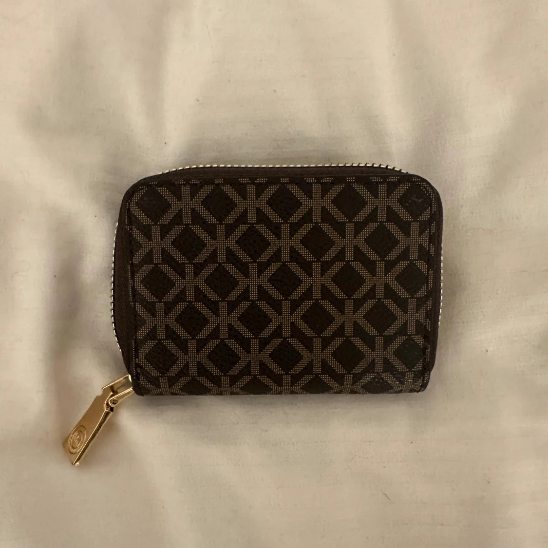 Brun plånbok från Michael Kors - 1