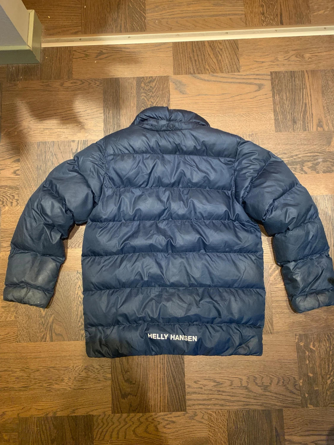 Mörkblå pufferjacka Helly Hansen - 1