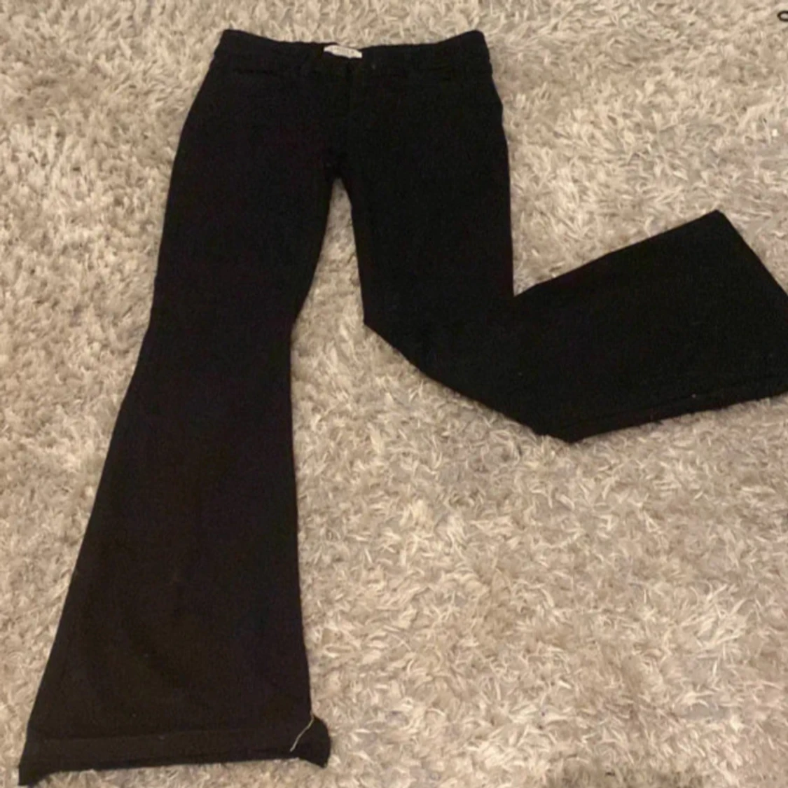 Svarta bootcut byxor