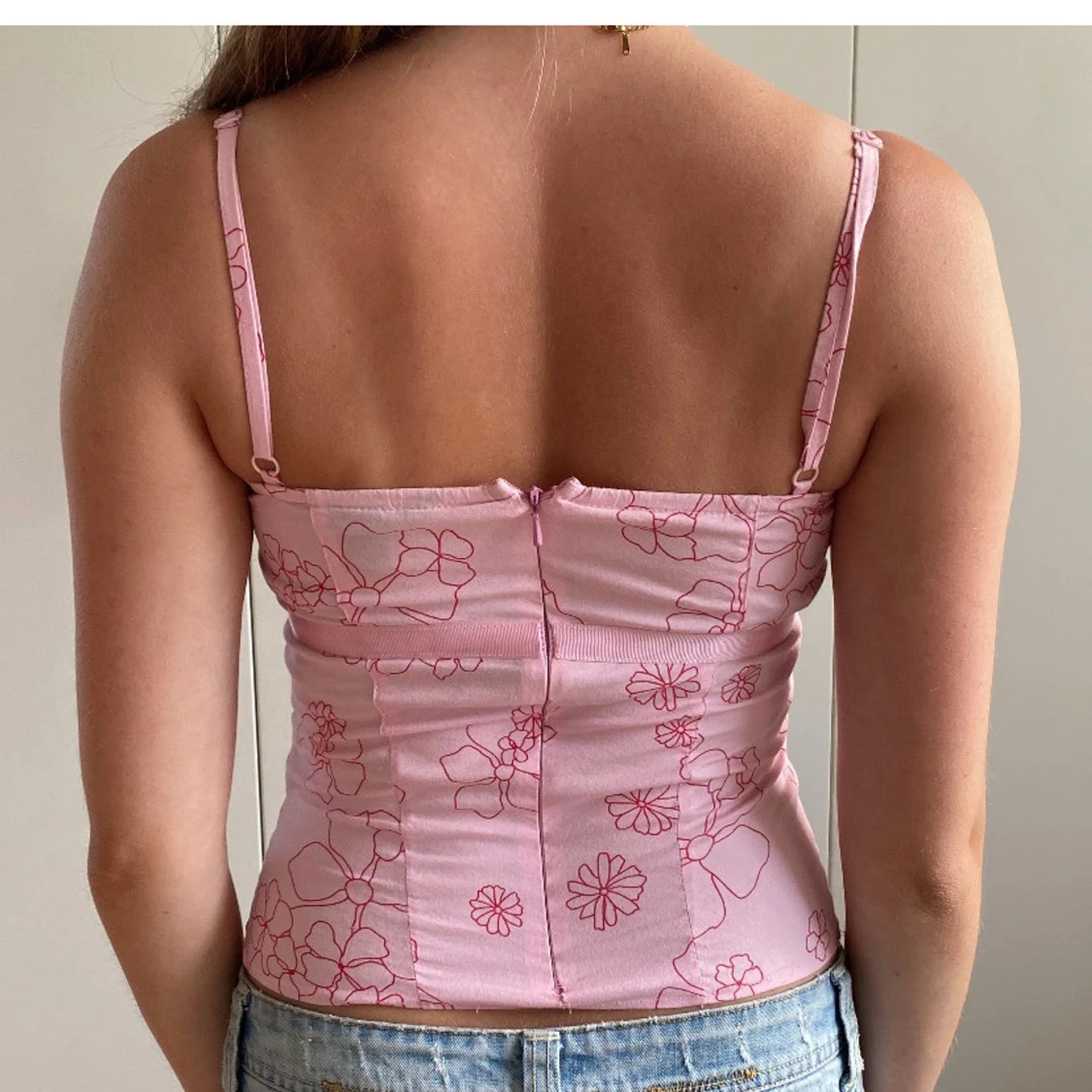 Rosa blommig topp med dragkedja - 1