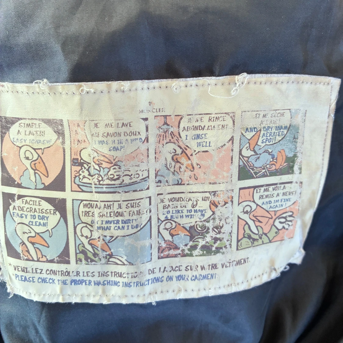 Mörkblå lång dunjacka från Moncler