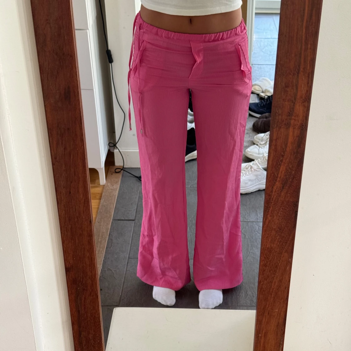 Rosa wide byxor med snörning