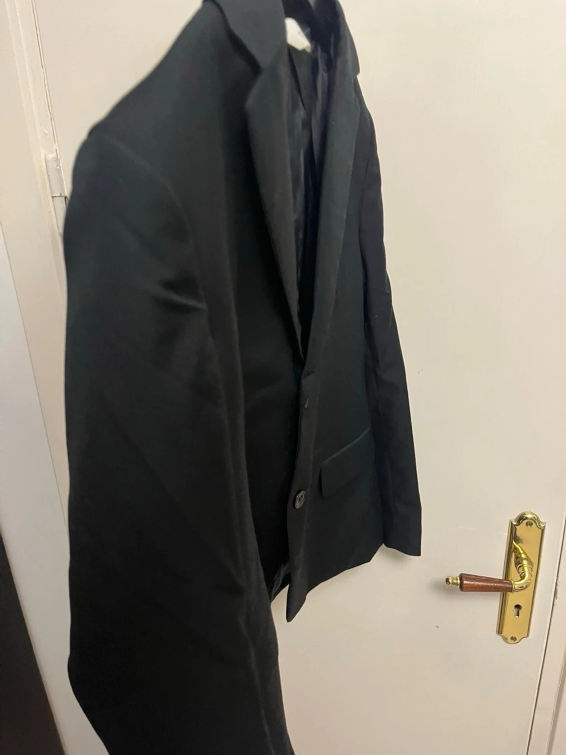 Svart H&M kavaj stl 152