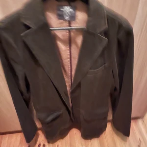 Brun kavaj - Skön kavaj perfekt för att ha över en stickad tröja eller skjorta