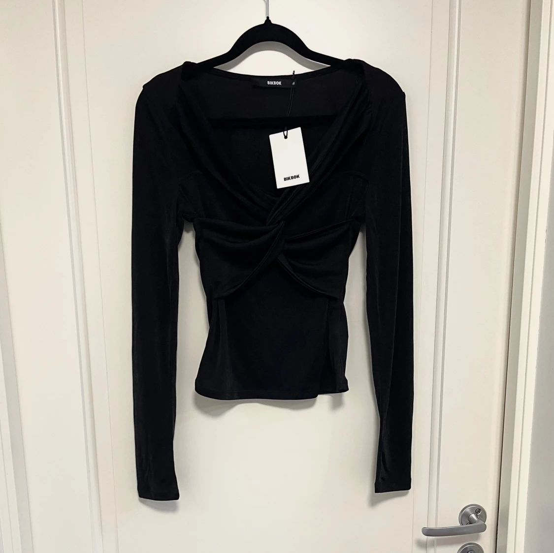 Svart topp Bik Bok S/M 