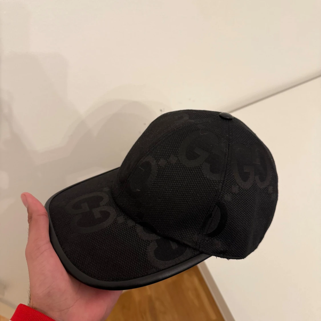 Svart keps från Gucci, storlek M