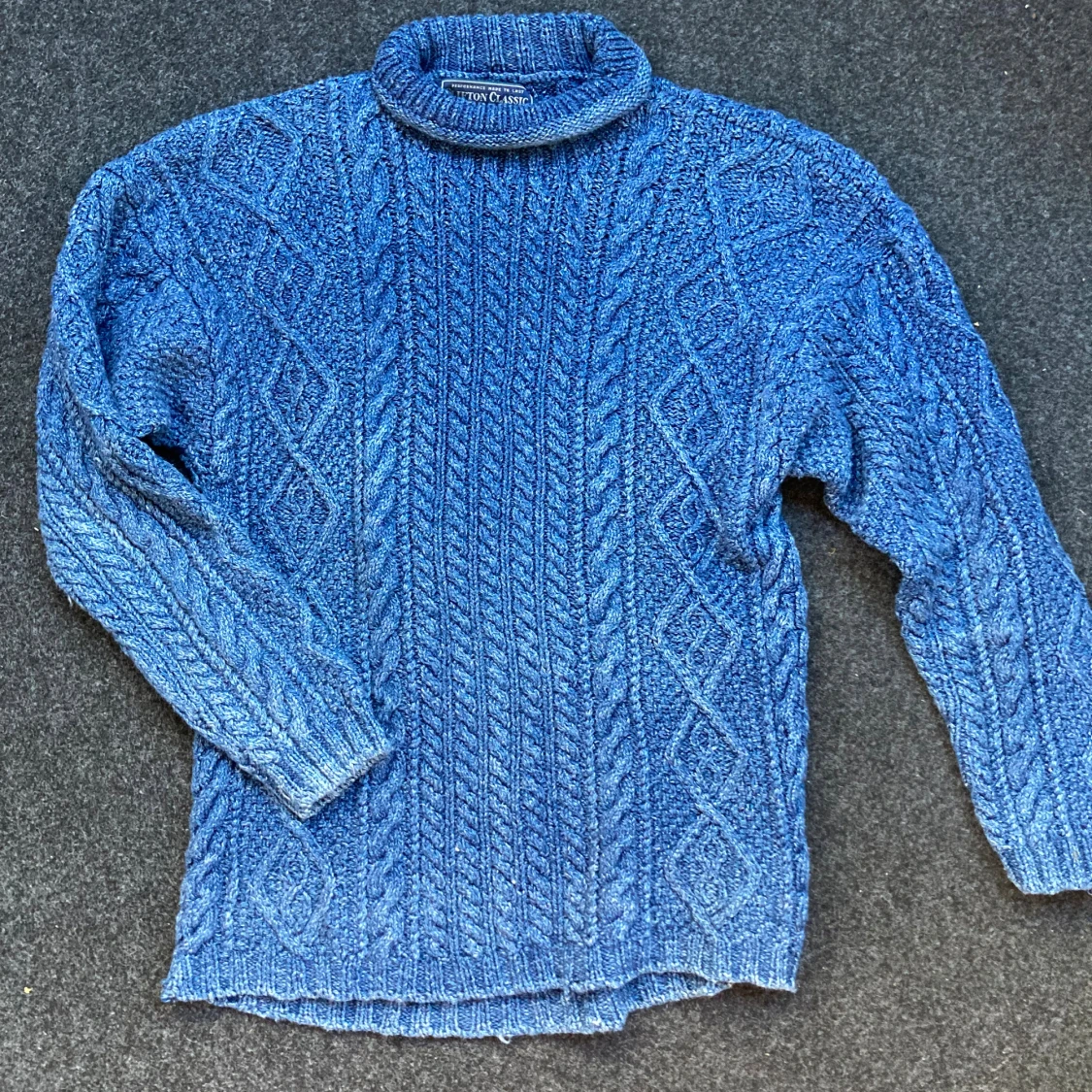 Blå kabelstickad polotröja Clifton Classic