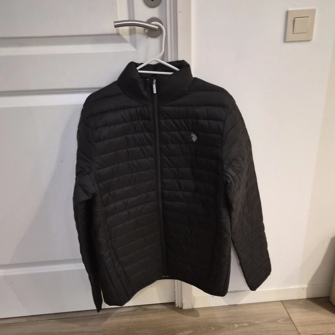 Svart pufferjacka från U.S. Polo Assn.