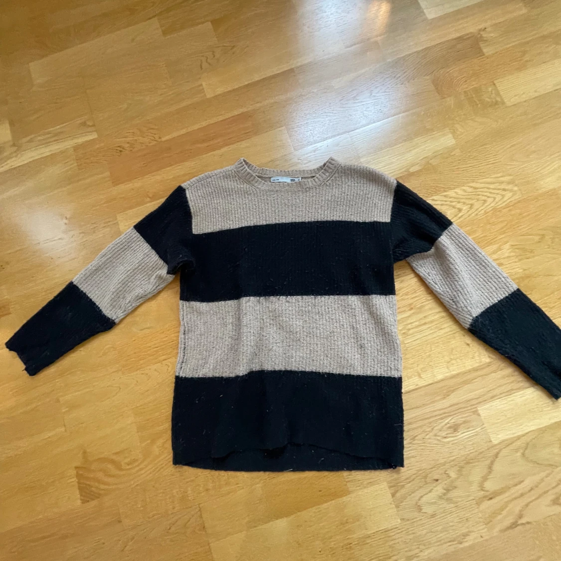 Randig stickad tröja från 157