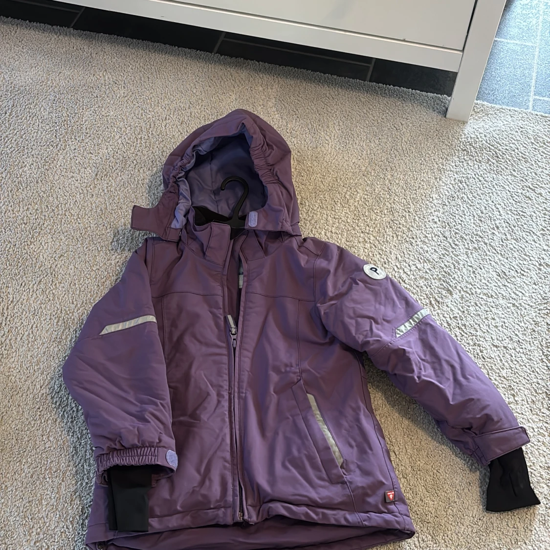 Lila vinterjacka från Polarn O. Pyret