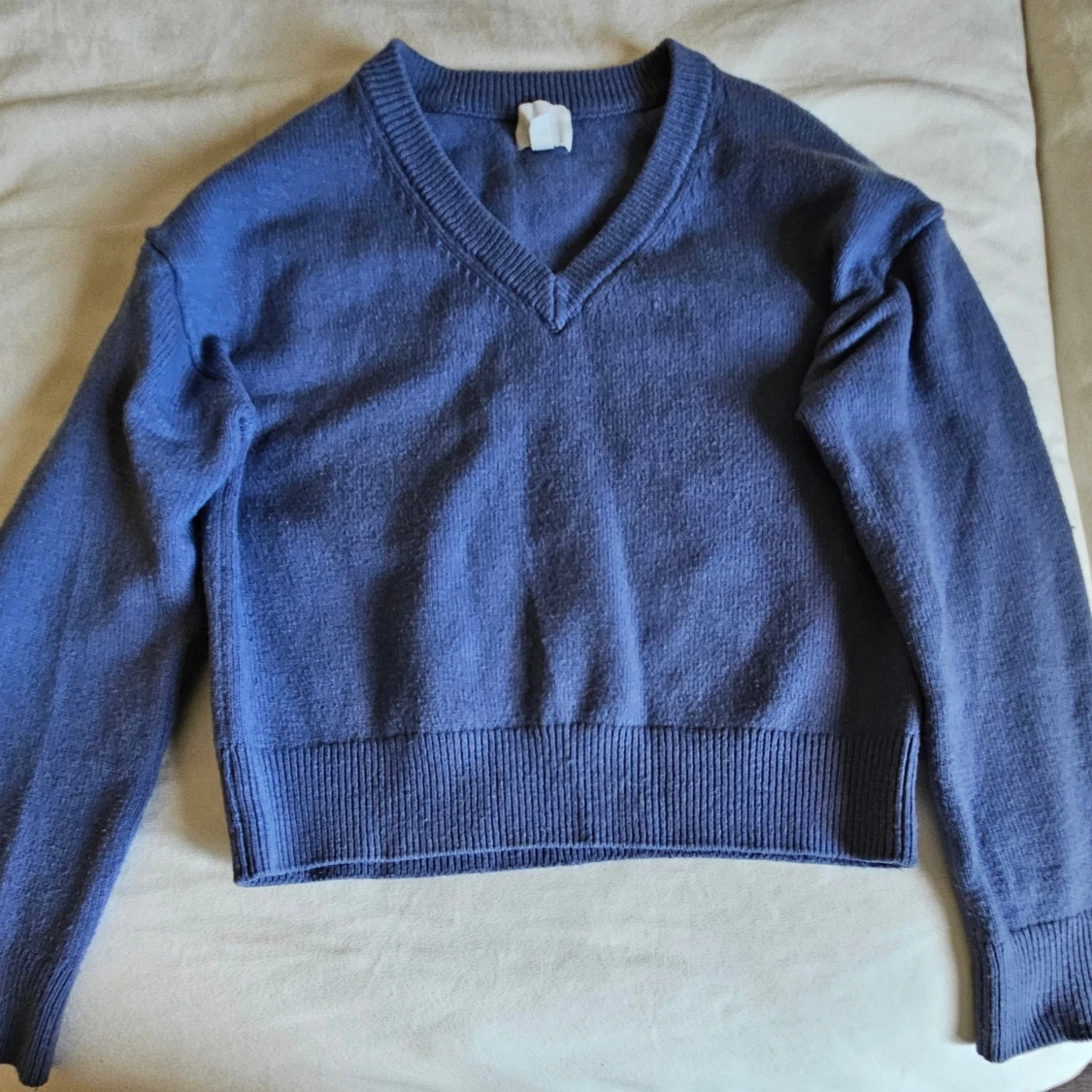 Blå stickad tröja från H&M