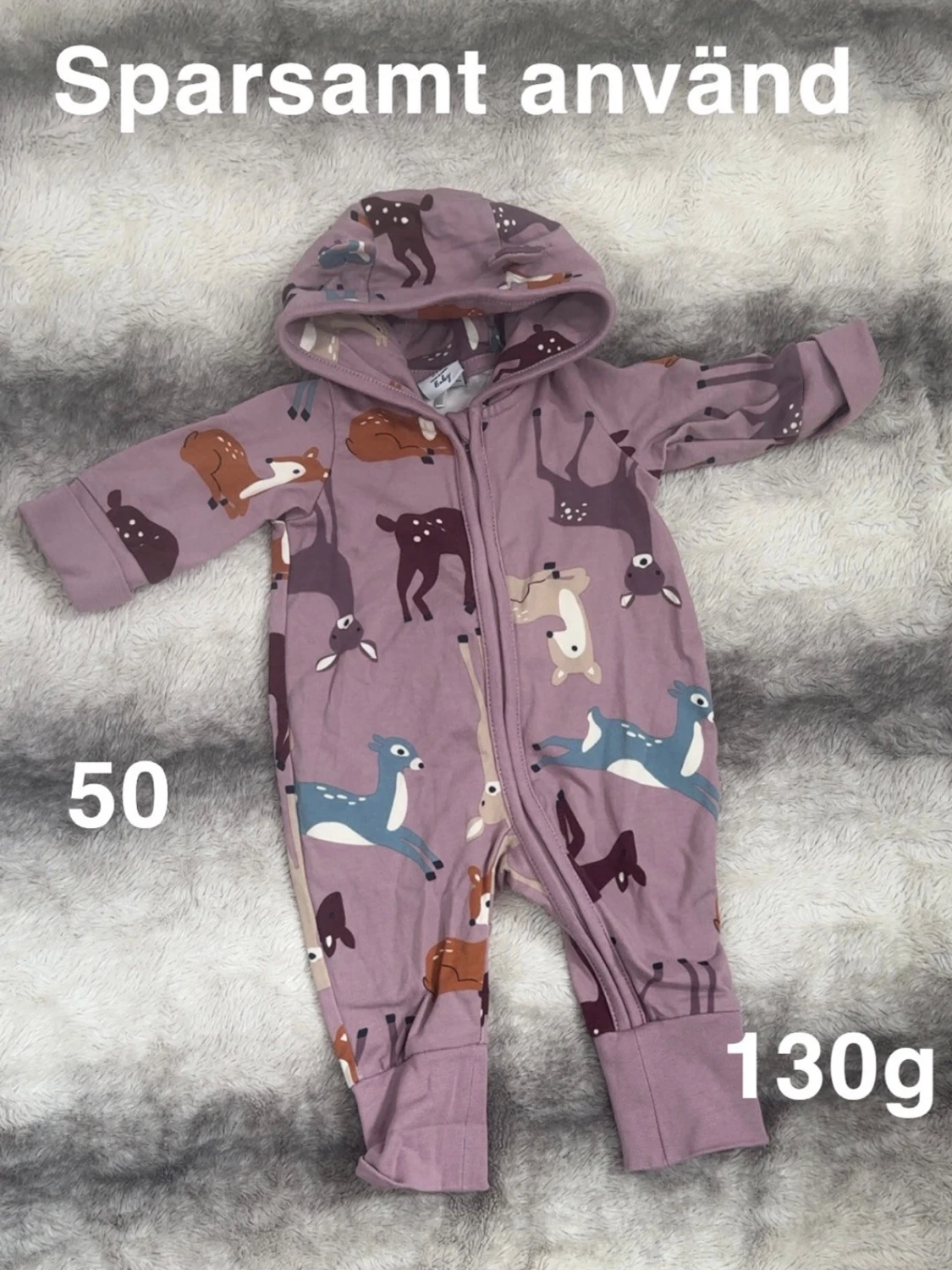 Lila jumpsuit med djurmotiv från Polarn o pyret