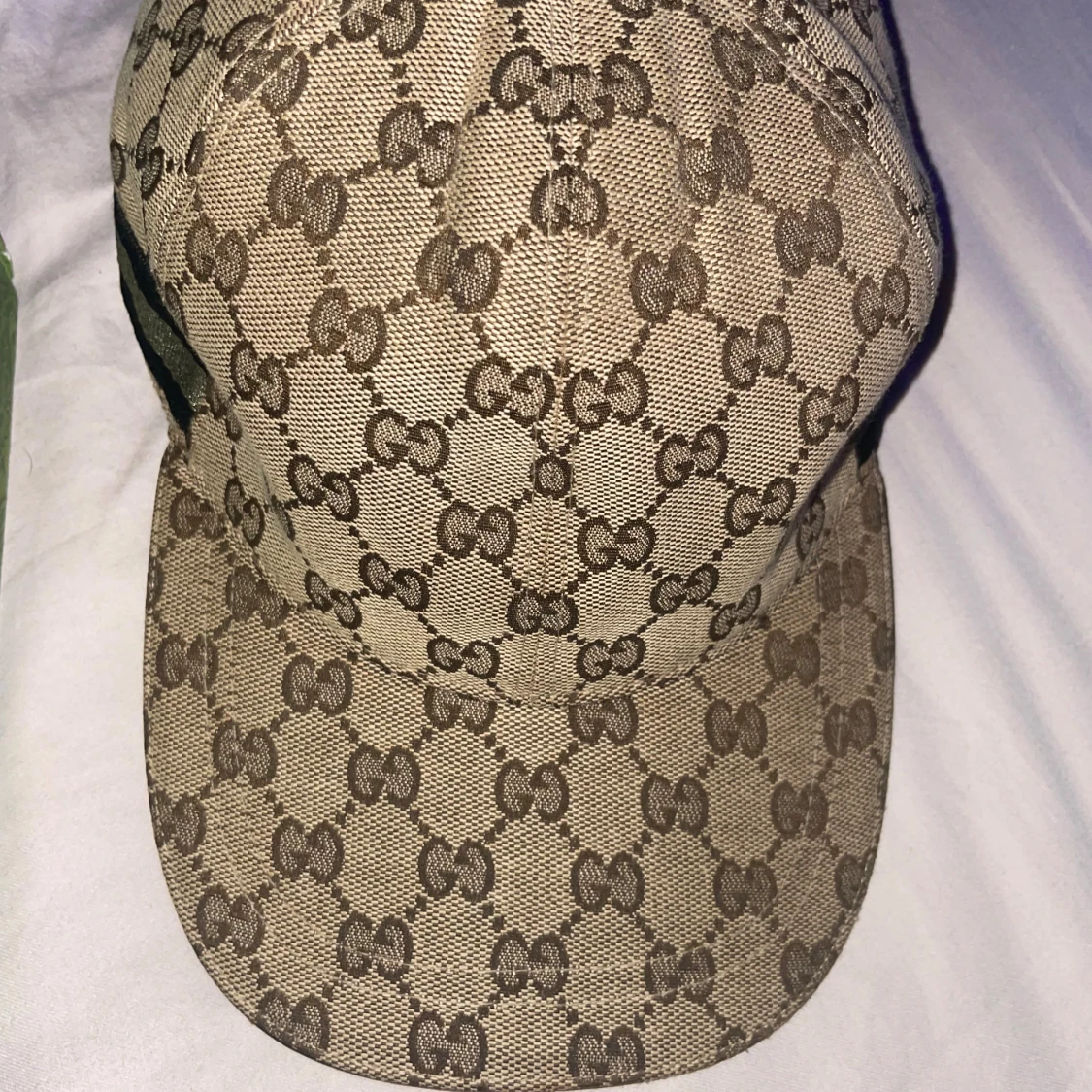 Beige Gucci keps med GG-mönster