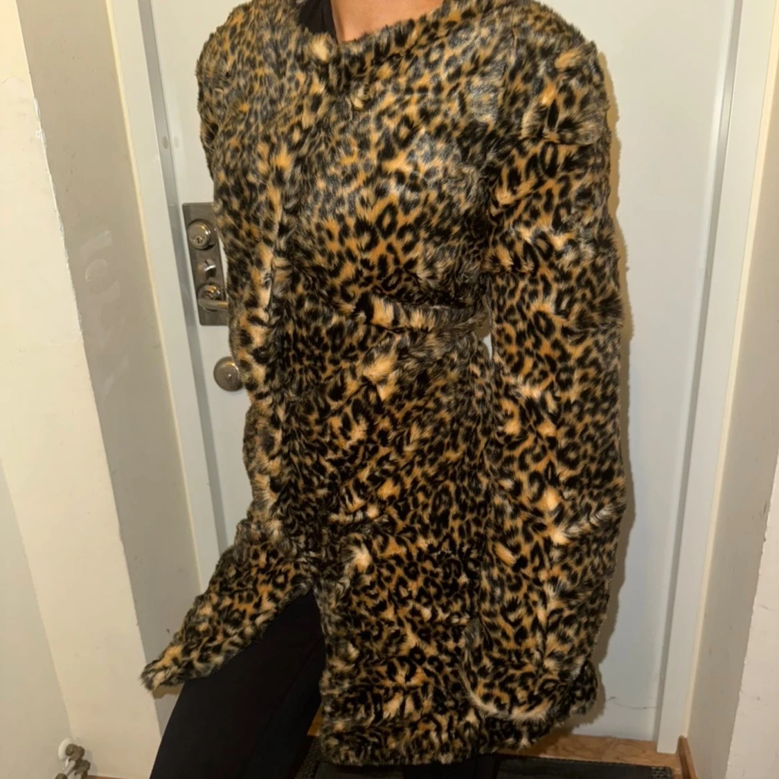 Elegant leopardmönstrad kappa