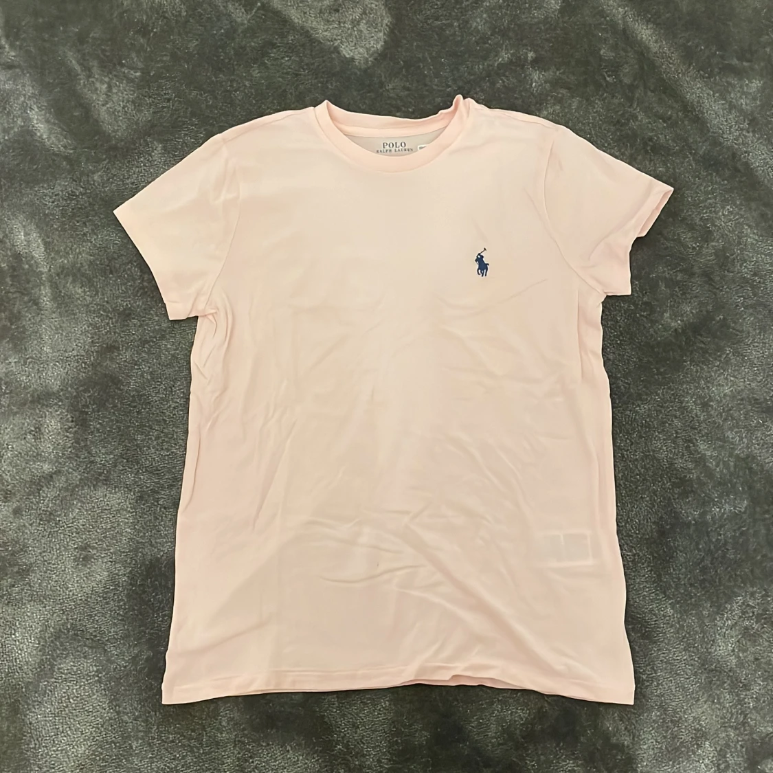 Ljusrosa polo t-shirt